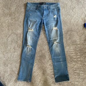 Express low rise cropped skinny distressed jeans.
